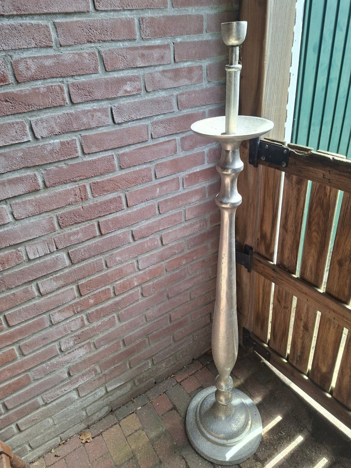 Grote aluminium kandelaar, Ophalen