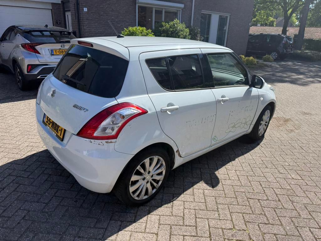 Suzuki Swift 1.2 5-D 2010 Wit, Voorwielaandrijving, 4 cilinders, 400 kg, Origineel Nederlands