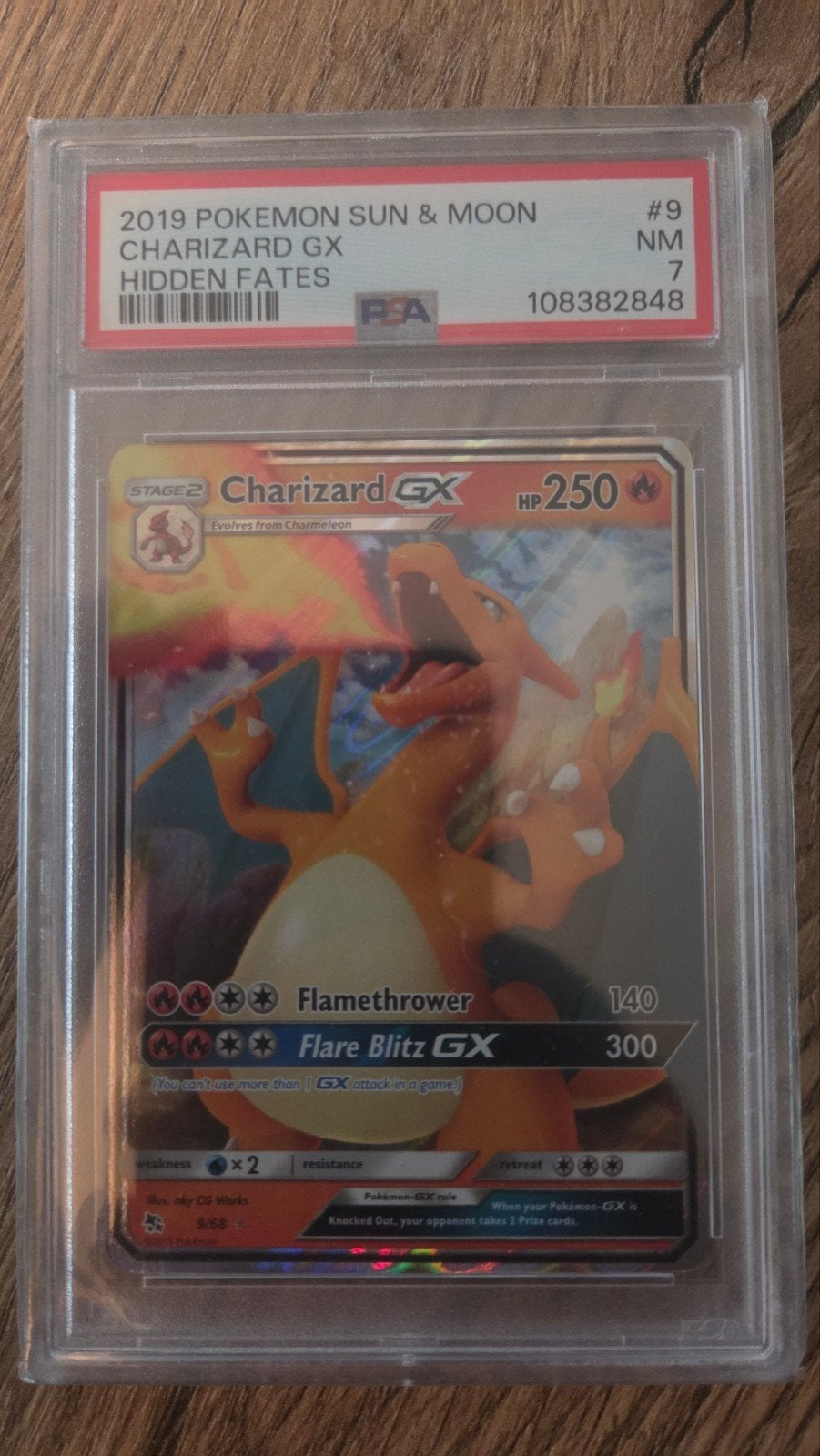Charizard GX Hidden Fates PSA 7 Pokémon Kaart, Ophalen of Verzenden, Zo goed als nieuw, Losse kaart