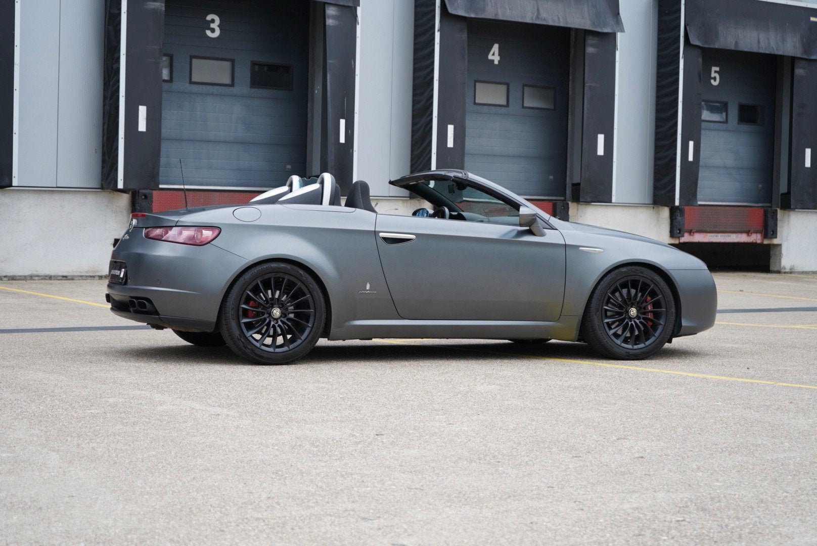 Alfa Romeo Spider 1.7 T ITALIA INDEPENDENT 1750, Auto's, Euro 5, Stof, Gebruikt, Zwart