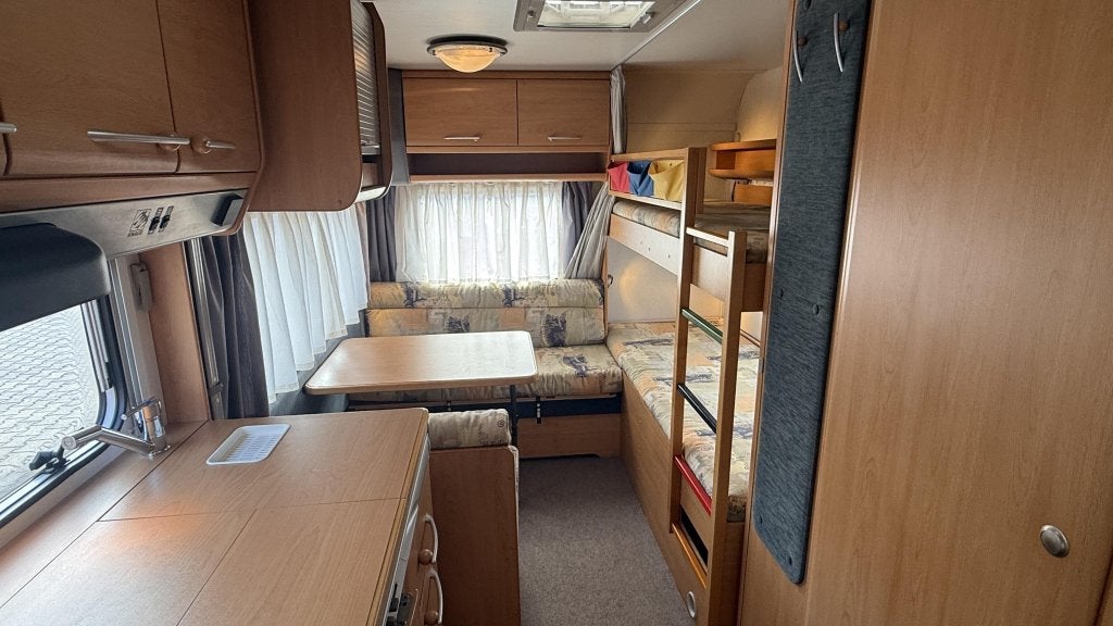 Knaus Sudwind 495 TK bouwjaar 2000 met voortent en luifel, Caravans en Kamperen, Caravans, Schokbreker, Overige typen, Bedrijf