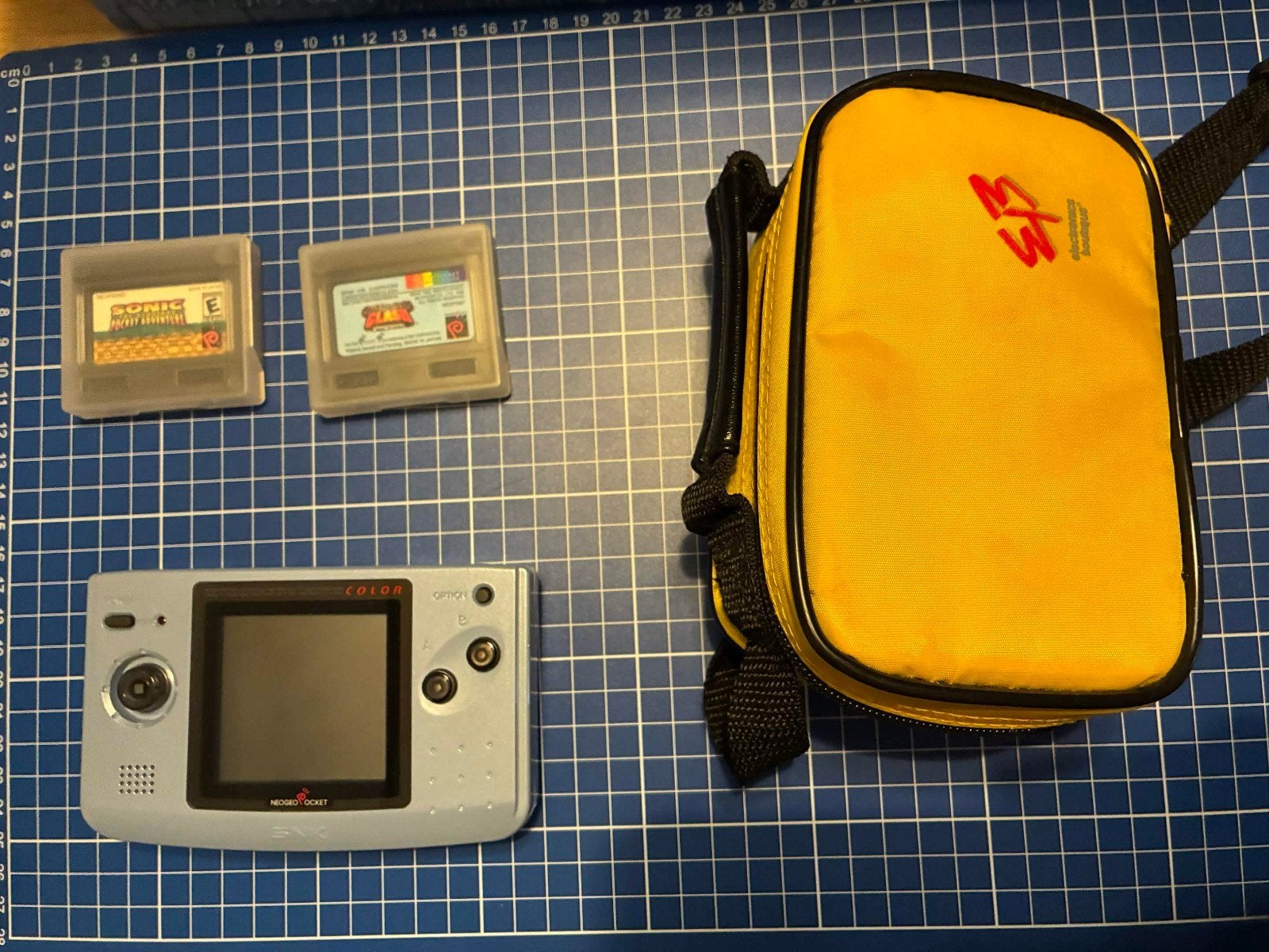 Neogeo Pocket color + hoesje & 2 games, Ophalen, Overige merken, Gebruikt
