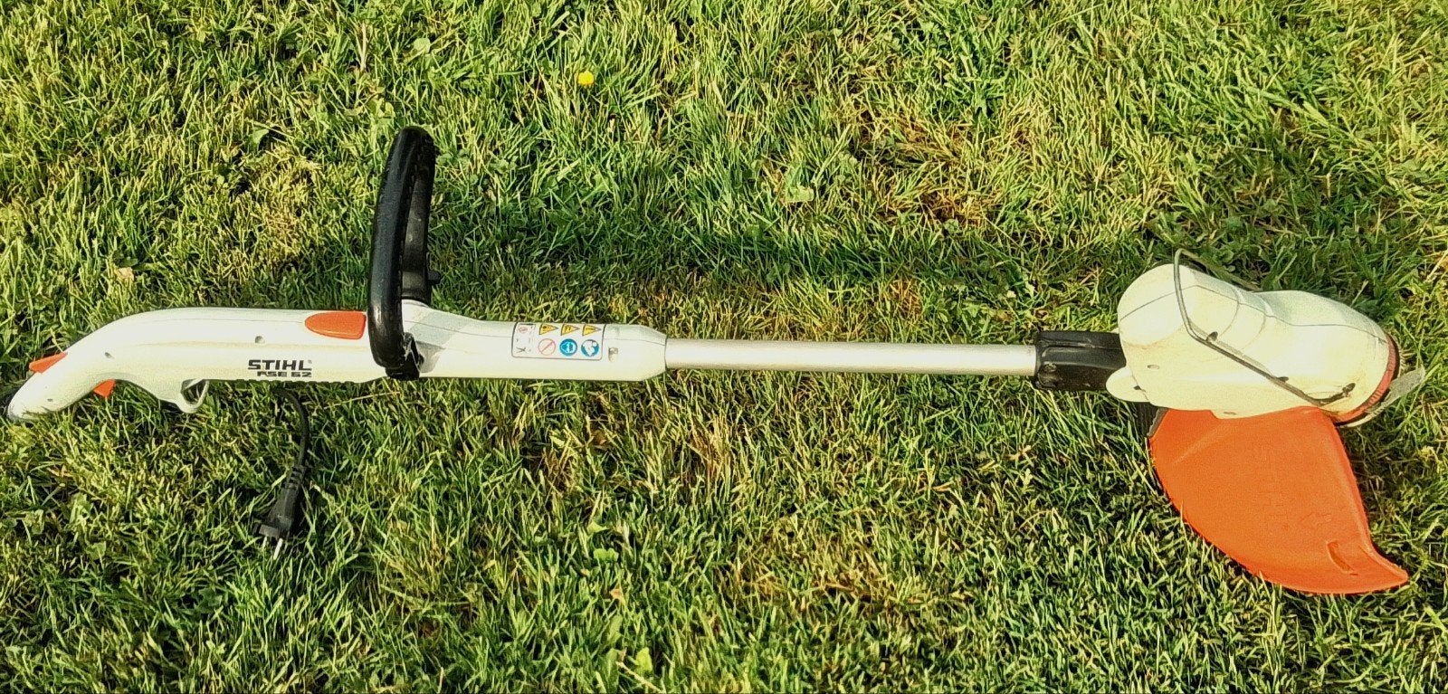 Stihl gras trimmer type  FSE 52. met 8 reserve mesjes., Tuin en Terras, Grastrimmers, Ophalen, Elektrisch