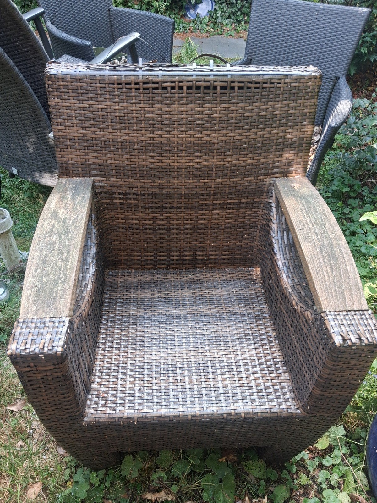 Wicker tuinstoel met houten armleuningen, Ophalen of Verzenden, Gebruikt, Wicker