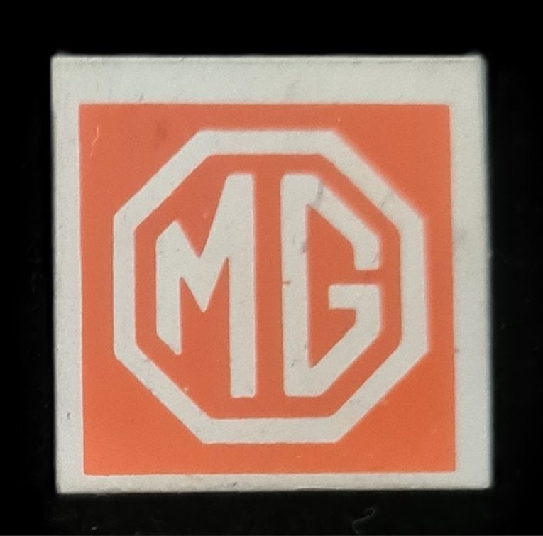 M.G. speld- oranje-wit blik, Verzenden, Gebruikt, Transport, Speldje of Pin