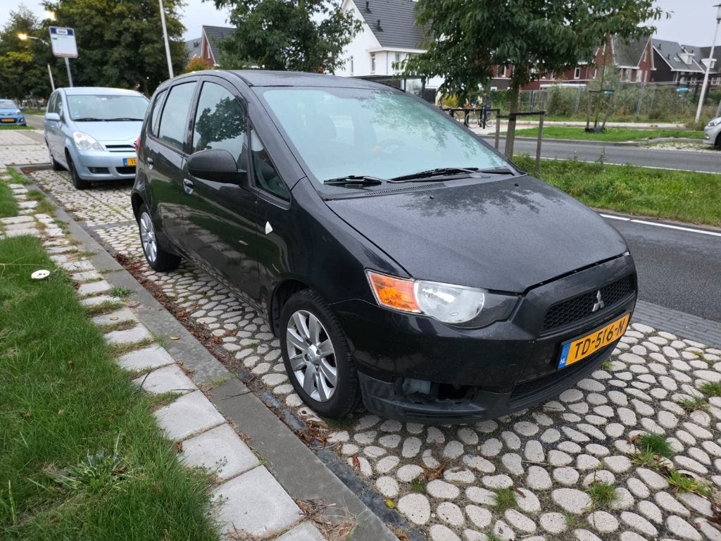 Zuinige Mitsubishi Colt 1.1 5-DR 2011 Zwart, Auto's, Voorwielaandrijving, 74 pk, Handgeschakeld, Particulier