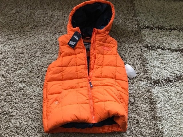 Puffa bodywarmer oranje maat 140-146 (10-11 jaar) nieuw met, Ophalen of Verzenden, Nieuw, Jongen of Meisje, Jas