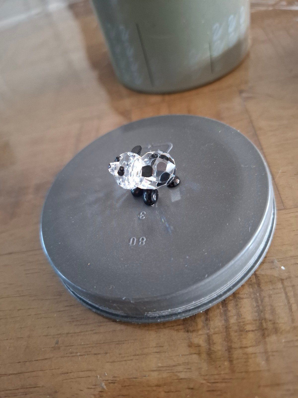 Mini kristallen panda beeldje, Ophalen