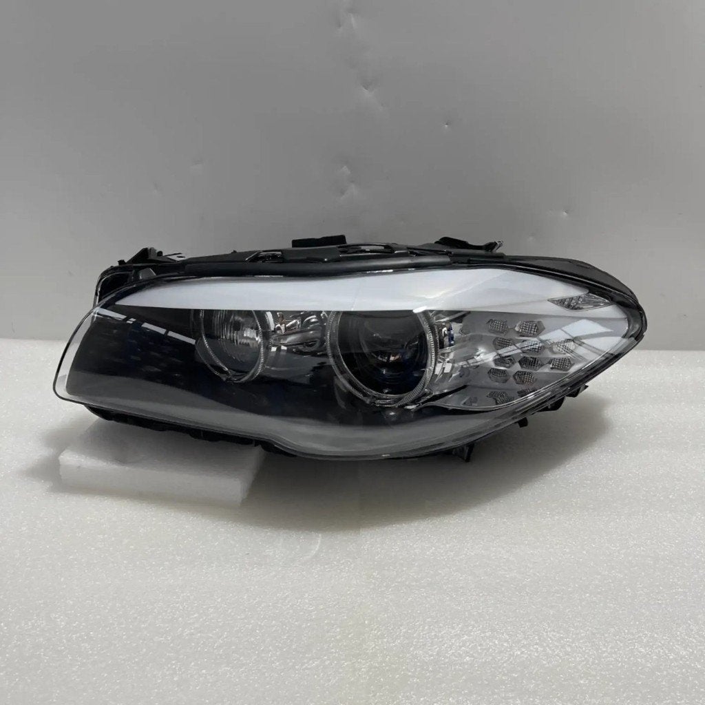 BMW 5-serie F10 F11 Bi-Xenon AHL koplamp links 63117271907, Verzenden, Gereviseerd, BMW