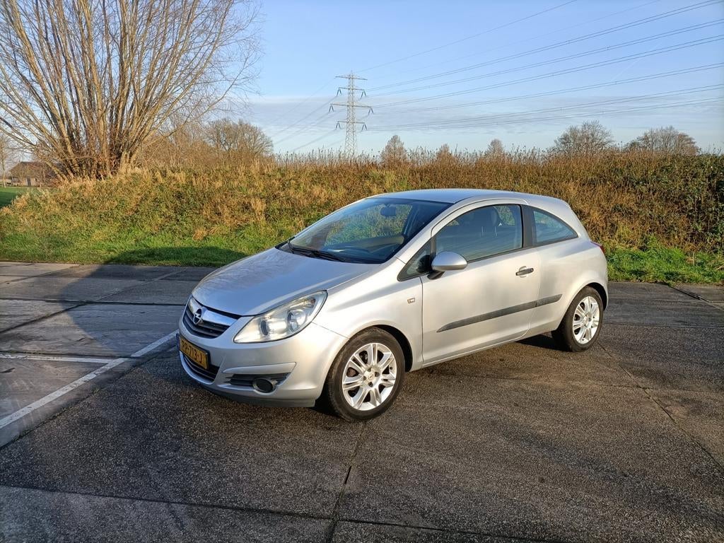 Opel Corsa 1.4  Automaat 2009 Grijs, Auto's, Opel, 4 cilinders, Bedrijf, 1000 kg, 500 kg