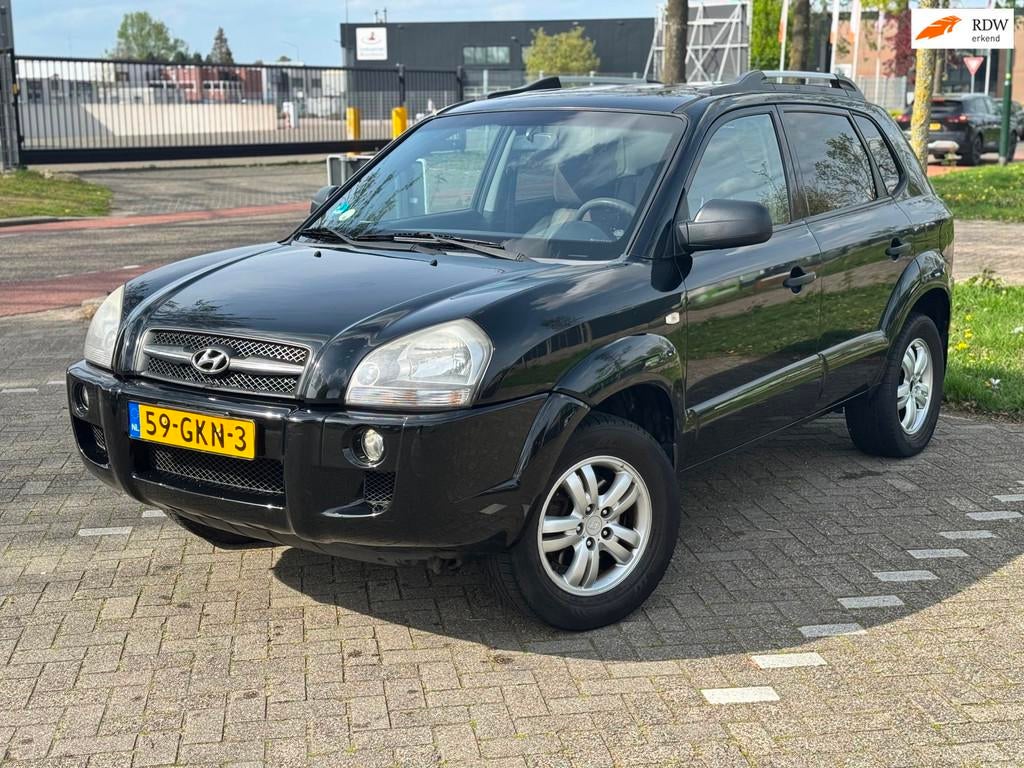 Hyundai Tucson 2.0i Dynamic Executive, Auto's, Hyundai, Parkeersensor, Stof, Gebruikt, Zwart