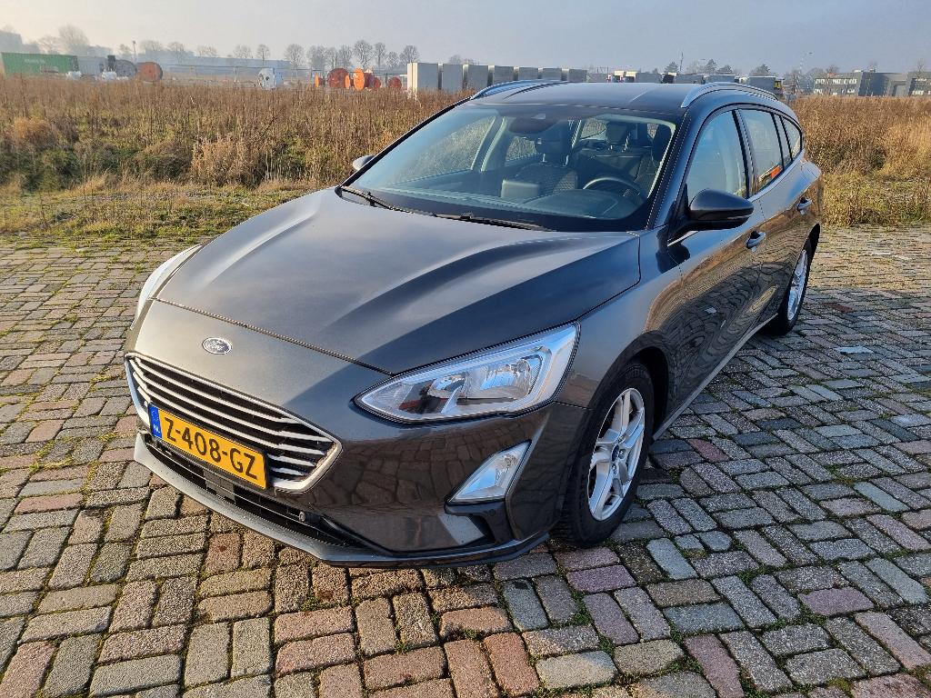 Ford Focus 1.0 Ecoboost 100pk 2019 Grijs Trekhaak, Auto's, 1283 kg, 100 pk, Metallic lak, Stationwagon