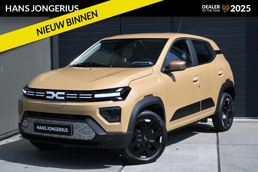 Dacia Spring Extreme 65 26.8 kWh | DC-LADER | CAMERA | NAVI, Auto's, Dacia, Gebruikt, Bruin, 4 stoelen, Leder en Stof