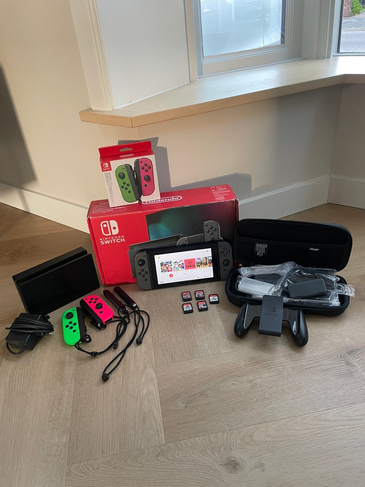 Nintendo Switch met extra controllers en games, Spelcomputers en Games, Spelcomputers | Nintendo Switch, Zo goed als nieuw, Switch Original