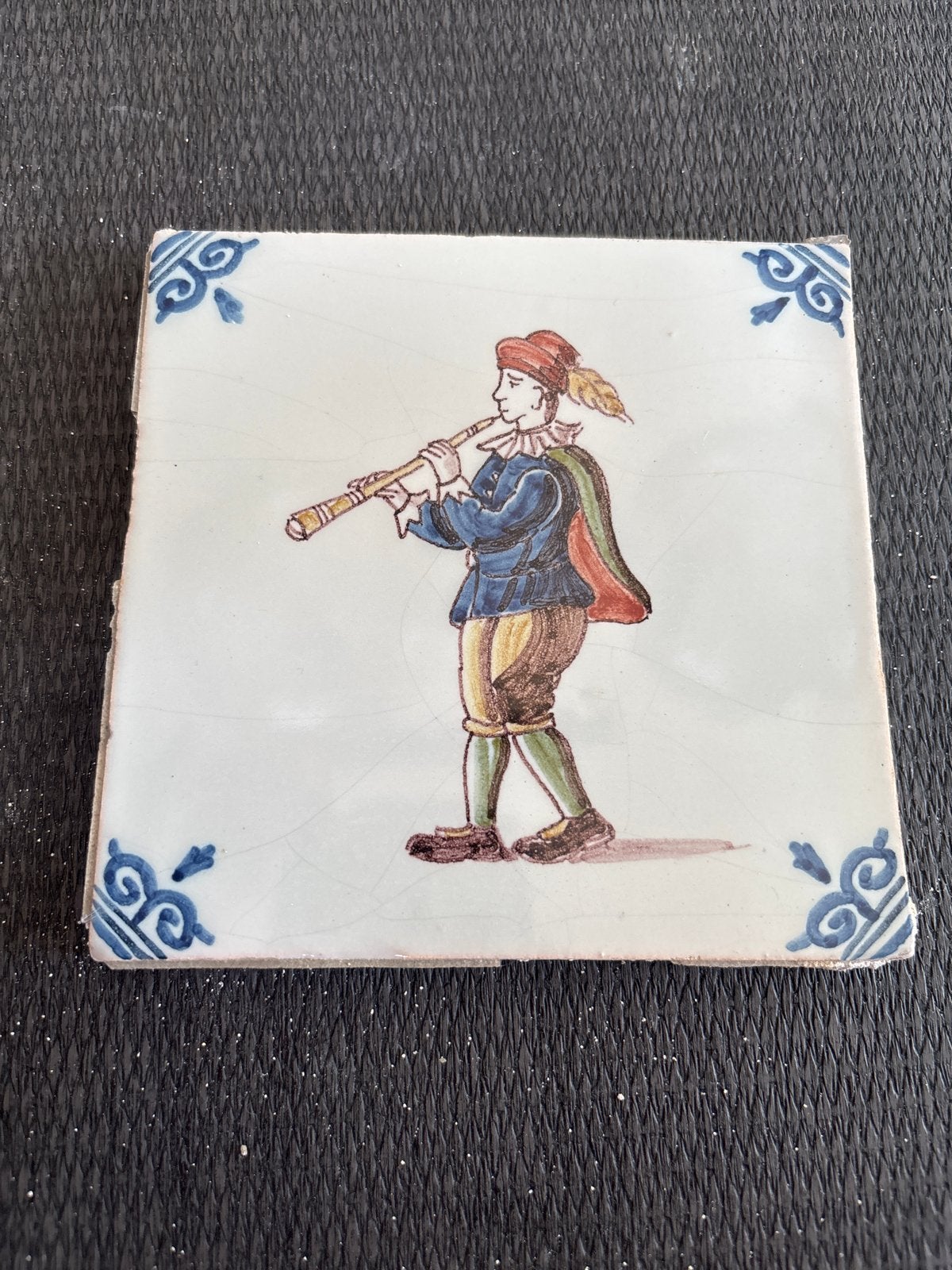 Antieke Hollandse tegel muzikant met fluits, Antiek en Kunst, Antiek | Wandborden en Tegels, Ophalen of Verzenden