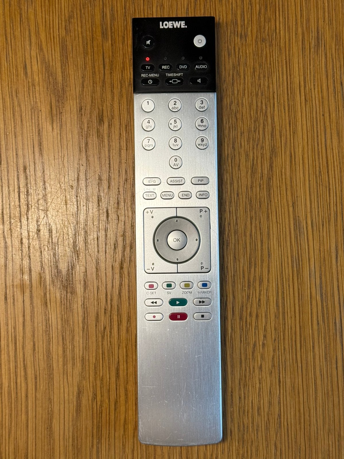 Loewe Assist afstandsbediening - origineel aluminium zilver, Ophalen of Verzenden, Zo goed als nieuw, Origineel, Game console