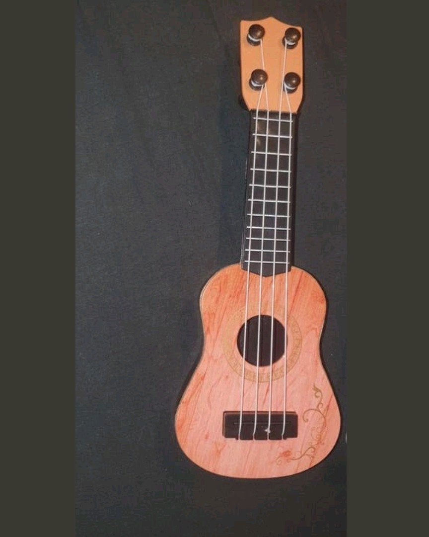 De Eerste Gitaar!  Mini Ukelele (25cm), Muziek en Instrumenten, Snaarinstrumenten | Gitaren | Akoestisch, Ophalen of Verzenden