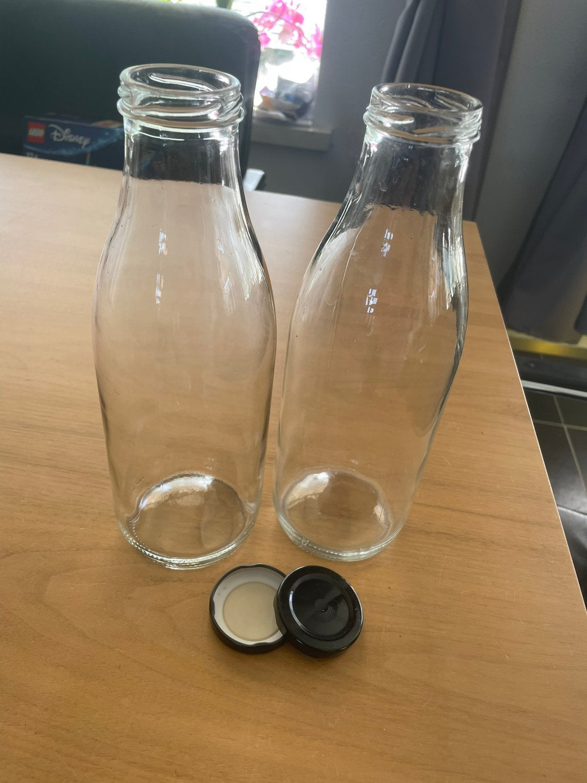 Set van 2 glazen literflessen, Glas, Ophalen of Verzenden, Zo goed als nieuw, Voorraadpot