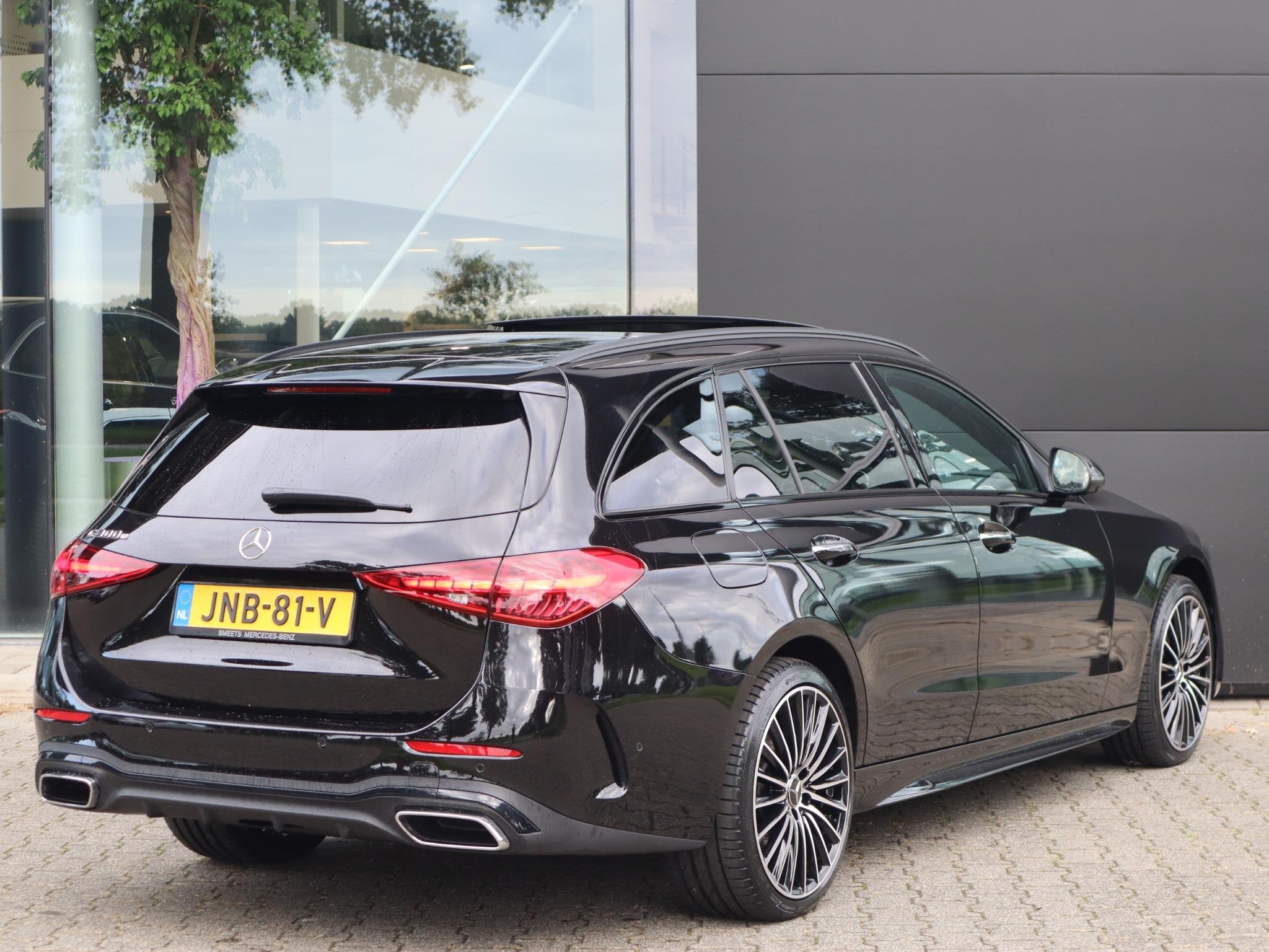 Mercedes-Benz C-klasse Estate 300 e Business Solution AMG, Auto's, Dealer onderhouden, 2020 kg, Zwart, Hybride Elektrisch/Benzine