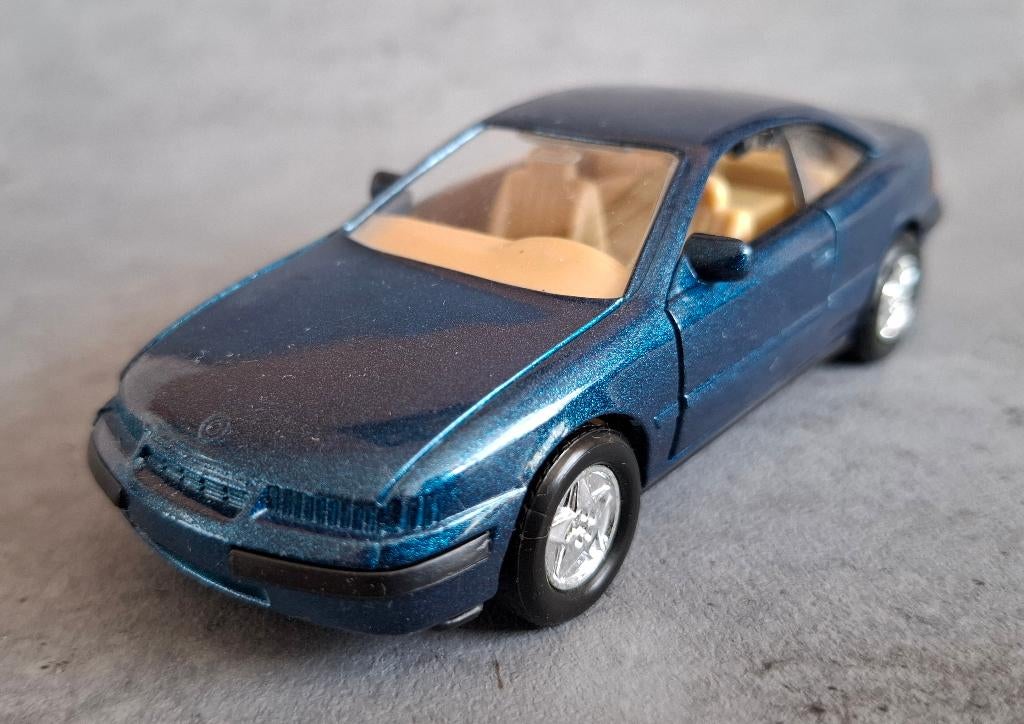 OPEL CALIBRA - Welly nr. 9041 inclusief doosje, Ophalen of Verzenden, Nieuw, Auto, Overige merken