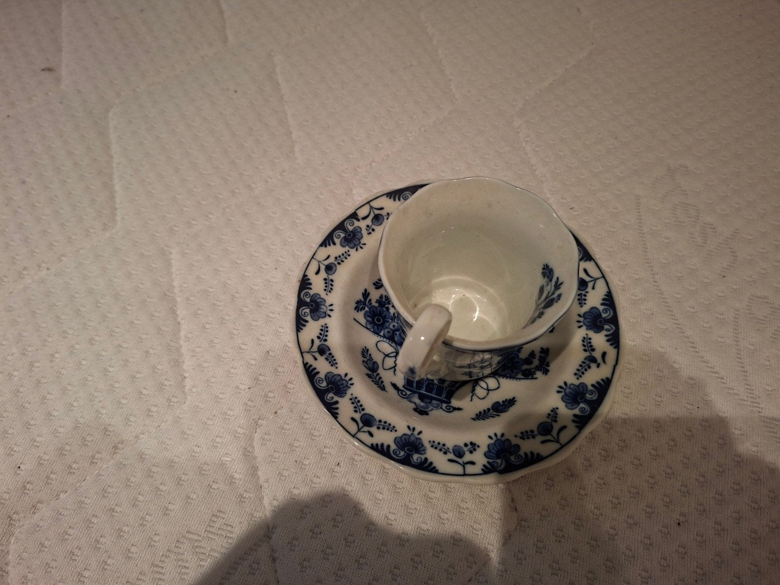 Antieke kop en schotel set - Bruin en Blauw bloemmotief, Antiek en Kunst, Ophalen of Verzenden