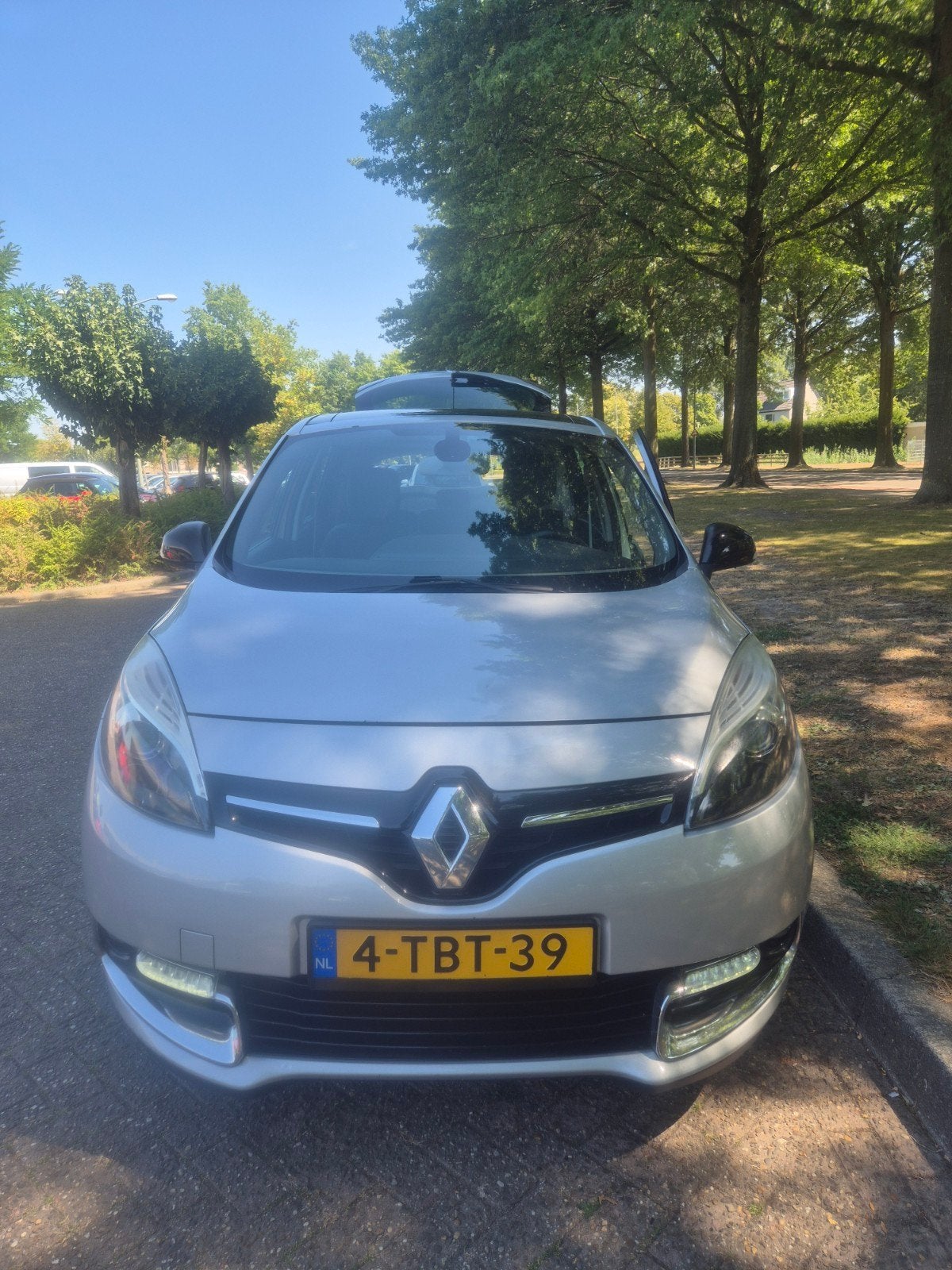 Renault Scénic 1.2 TCE Bose 85KW 2014 Grijs, Auto's, Voorwielaandrijving, Euro 5, 4 cilinders, Leder en Stof
