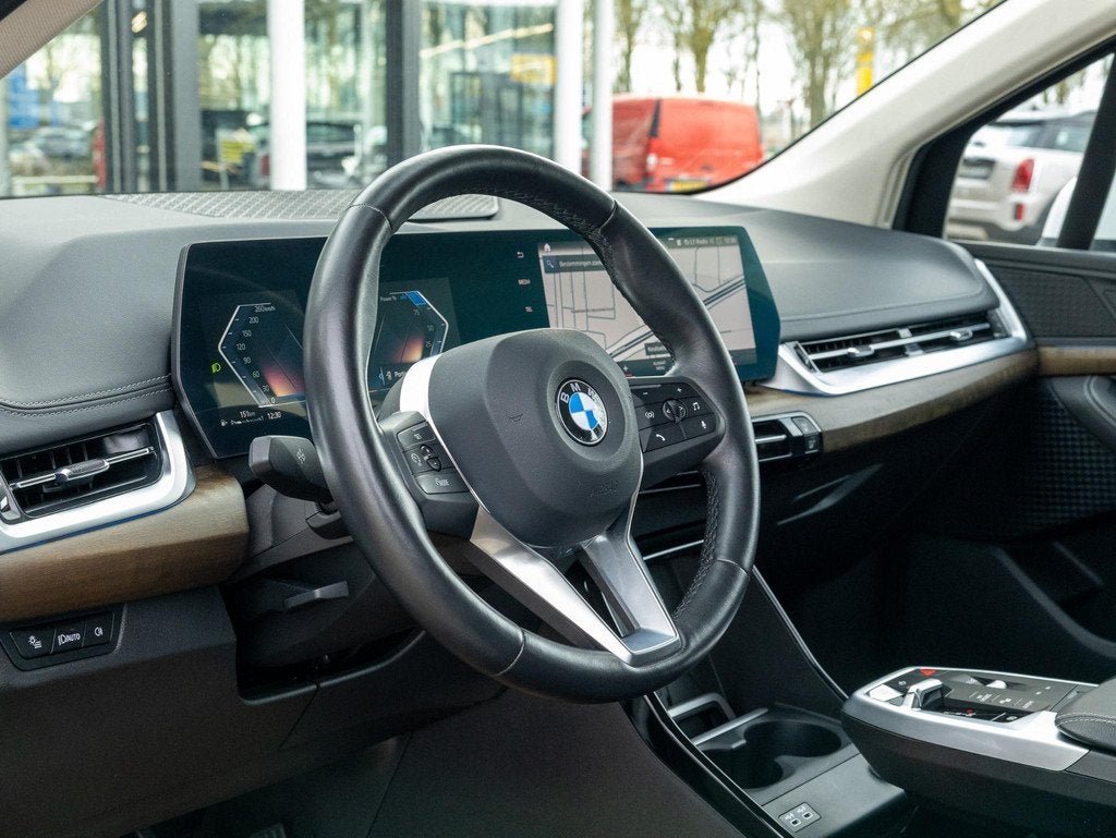 BMW 2-serie Active Tourer 218i Luxury|Leder|Camera|Keyless, Auto's, BMW, 136 pk, Gebruikt, 1445 kg, Wit