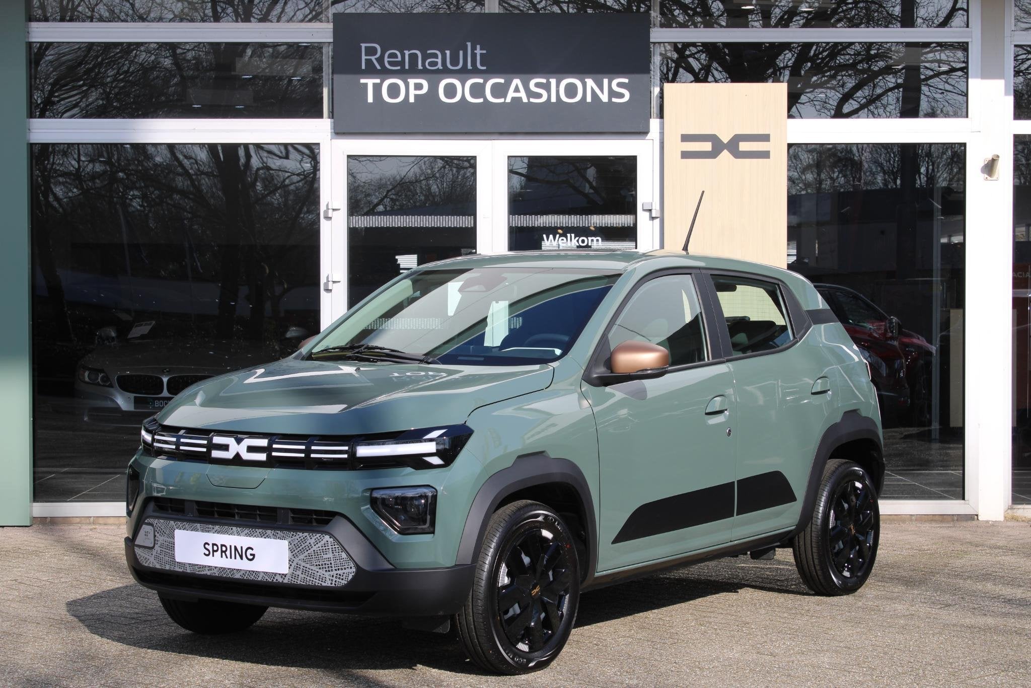 Dacia Spring Extreme 65 26.8 kWh Lichen Kaki, Auto's, Huisgarantie, Met garantie (alle), 4 stoelen, Leder en Stof