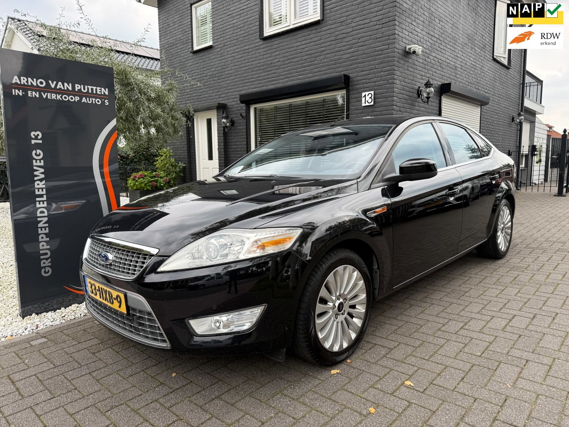 Ford Mondeo 2.0-16V Titanium FlexiFuel, Auto's, Gebruikt, Zwart, Origineel Nederlands, Handgeschakeld
