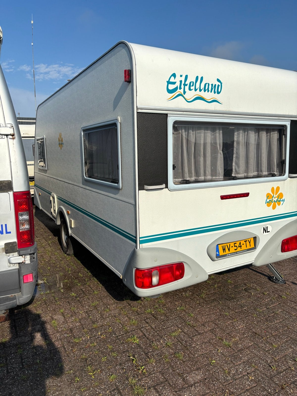 Eifelland Holiday Caravan - Compact en Compleet, Caravans en Kamperen, Caravans, Rondzit, Omvormbare zithoek, 750 - 1000 kg, 4 tot 5 meter