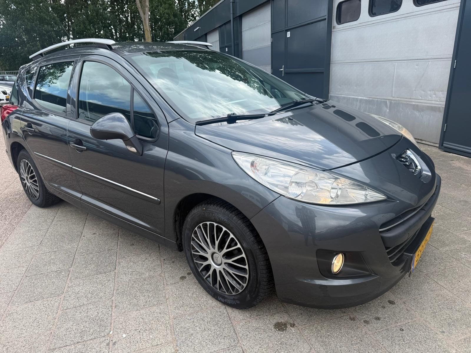 Peugeot 207 1.4 VTI 16V SW 2011, Auto's, Voorwielaandrijving, Stof, Metallic lak, Origineel Nederlands
