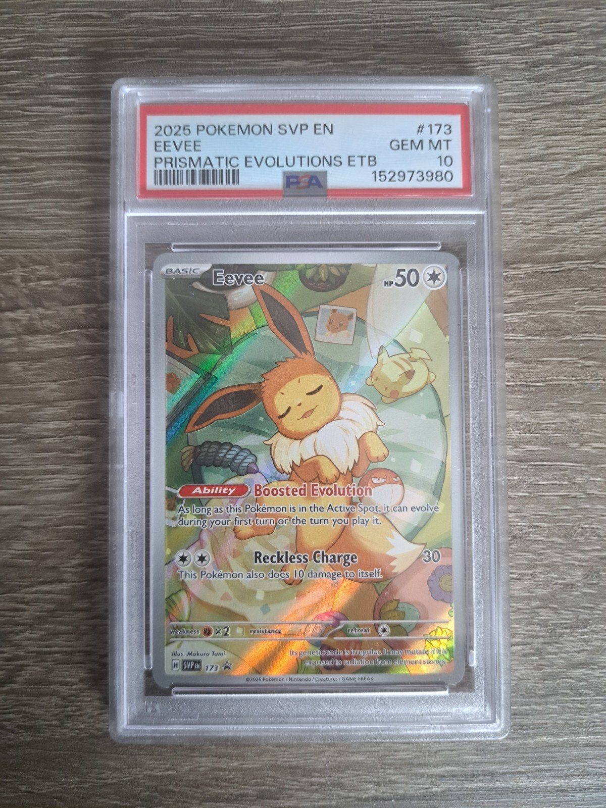 PSA 10 Eevee Prismatic Evolutions ETB #173 Pokémon Kaart, Ophalen of Verzenden