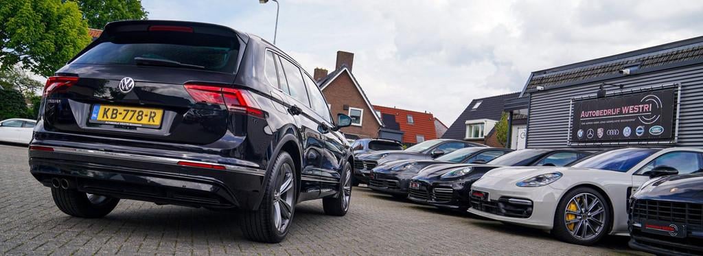 Volkswagen Tiguan 1.4 TSI ACT Comfortline | Massage | Stoelv, Auto's, Volkswagen, Stof, 4 cilinders, 150 pk, Zwart