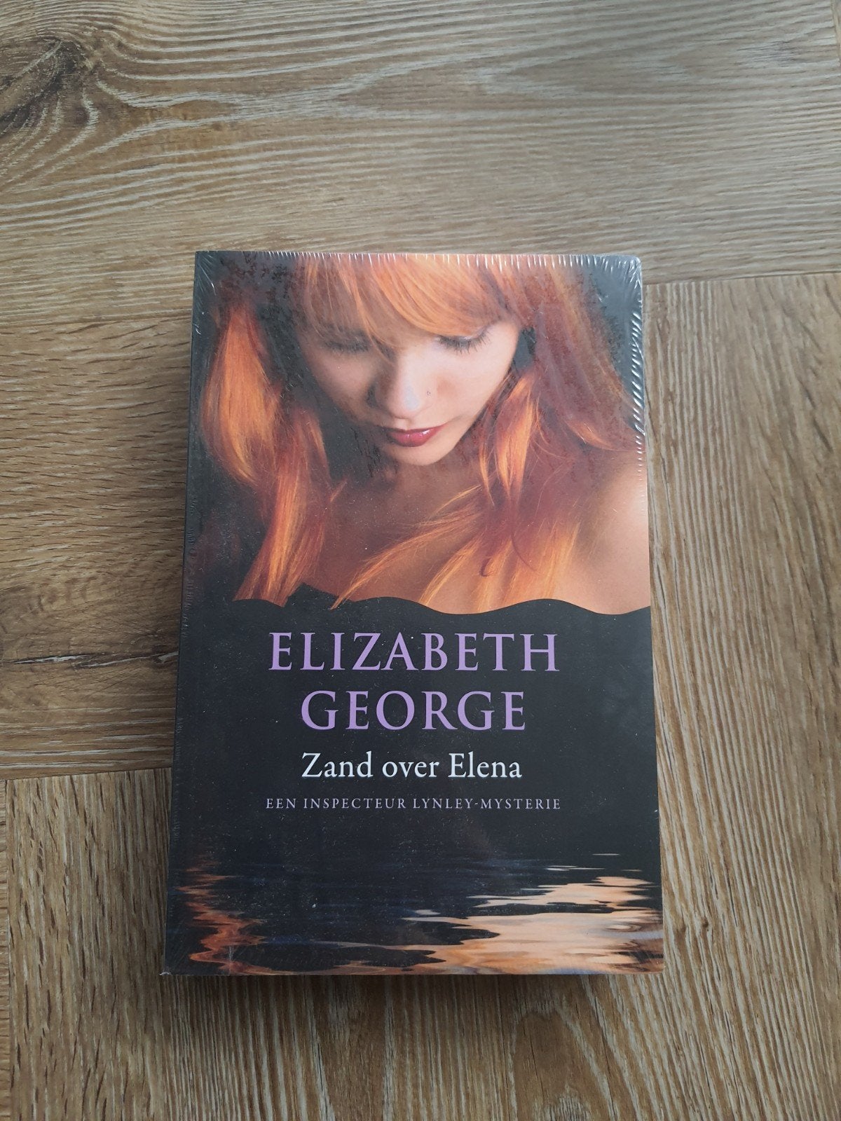 Nieuw boek *zand over elena* van elisabeth george, Ophalen, Nieuw