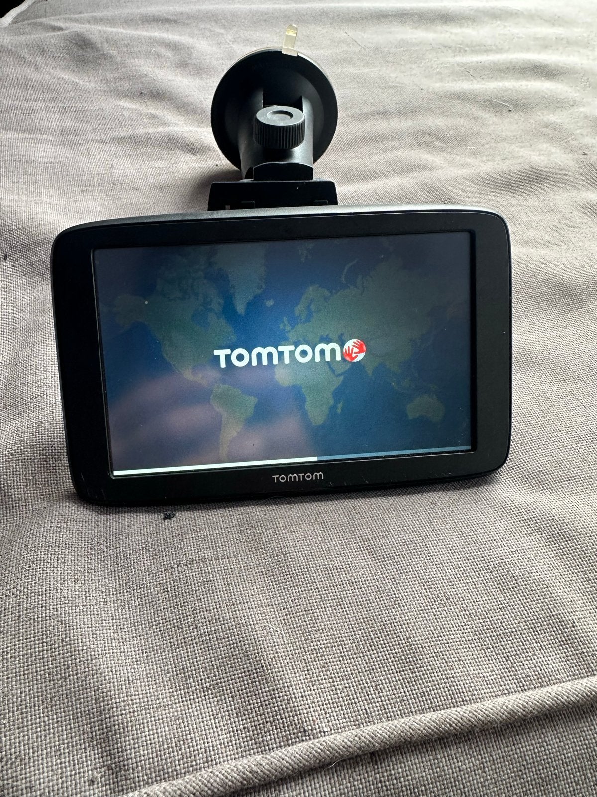 Goed werkende TomTom met auto ruit houder, Ophalen, Gebruikt