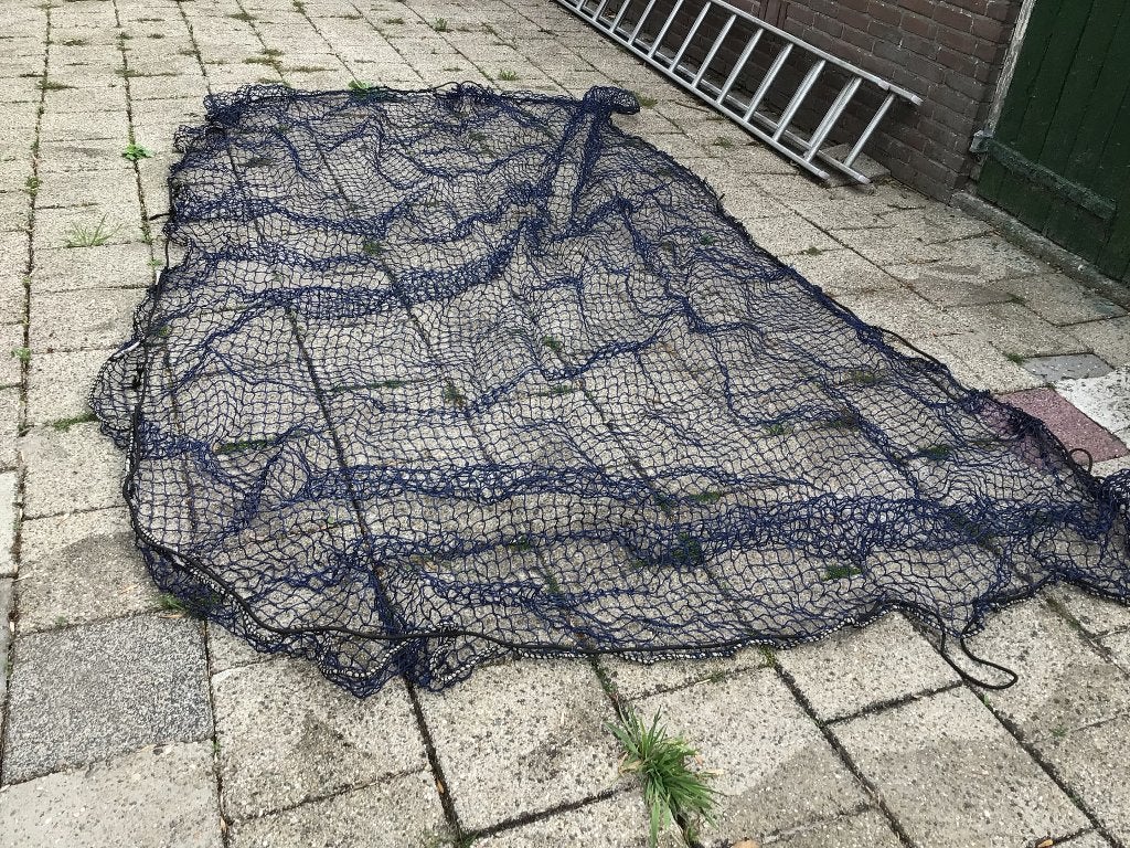 Afdek net voor aanhangwagen, Ophalen, Gebruikt