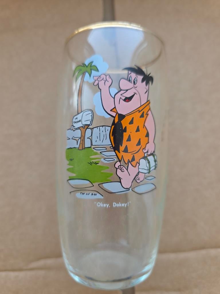 Dit vintage glas met Fred Flintstone frisdrank Exota, Verzamelen, Glas en Borrelglaasjes, Gebruikt, Ophalen of Verzenden