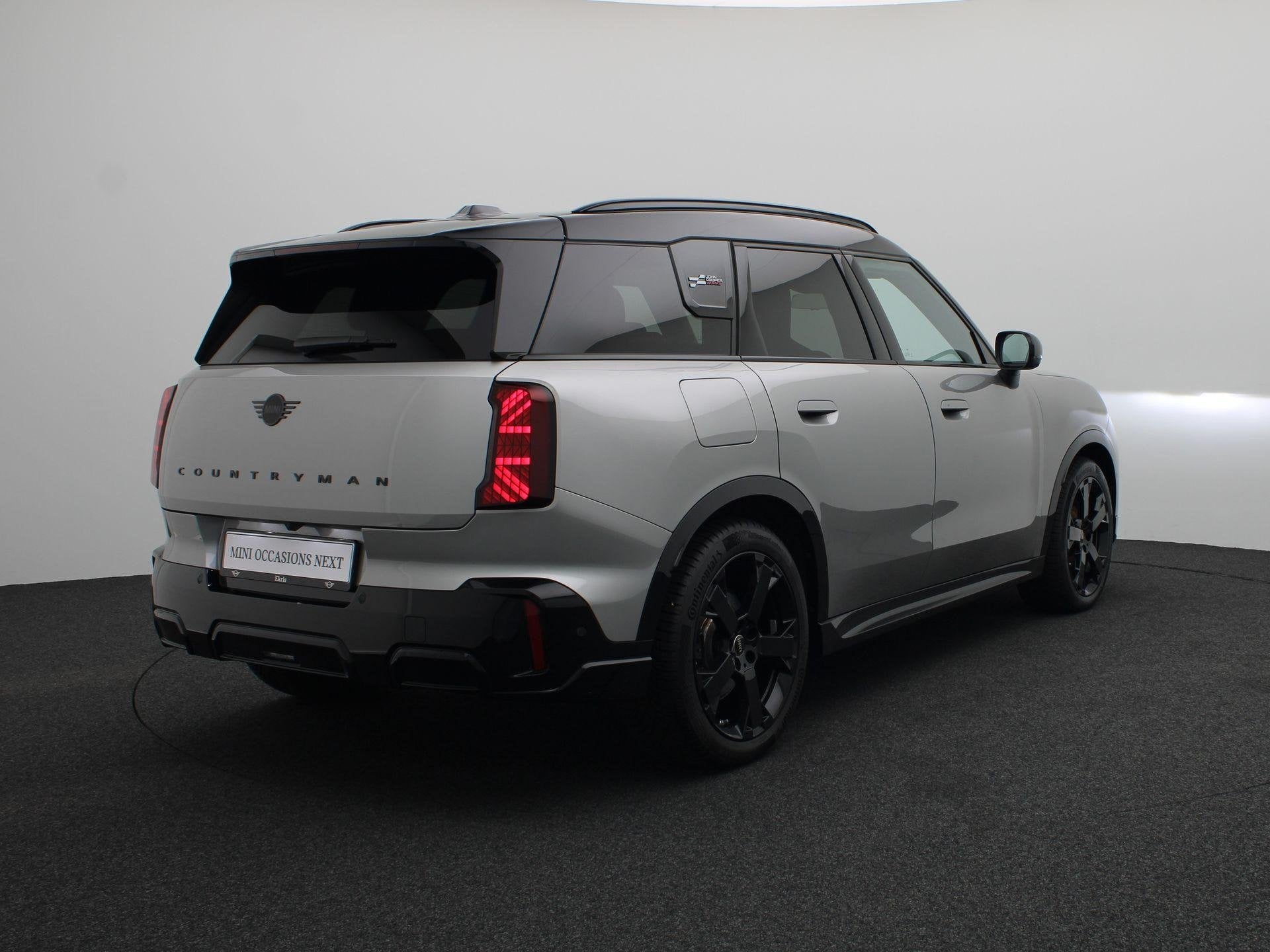 MINI Countryman E JCW Pakket + Pakket XL + Glazen panoramada, Auto's, Gebruikt, Countryman, Met garantie (alle), Leder en Stof