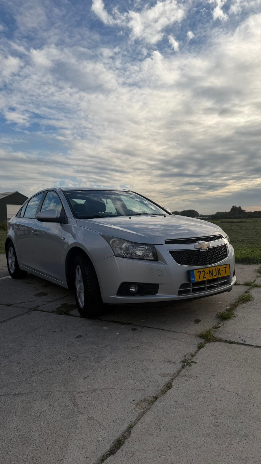 Chevrolet Cruze ls 1.8 2010 Grijs, Auto's, 4 cilinders, 1796 cc, Origineel Nederlands, Handgeschakeld