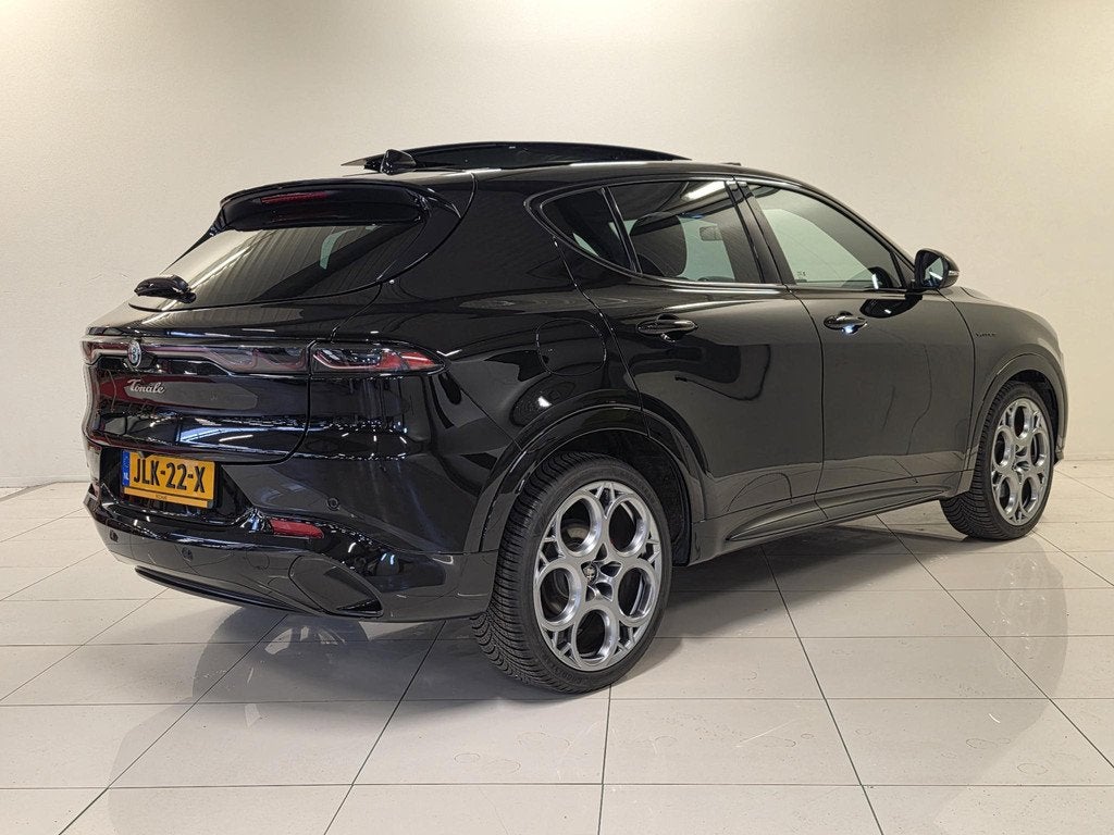 Alfa Romeo Tonale 1.5T Hybrid Veloce 160pk | Leer | Panorama, Auto's, Alfa Romeo, Gebruikt, 4 cilinders, 160 pk, Zwart