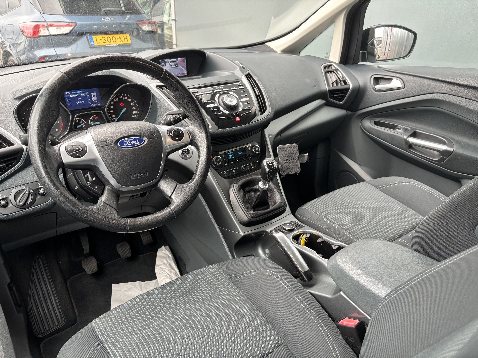 Ford Grand C-Max BWJ 2015 1.0 126 PK Edition Plus 7p. TREKHA, Auto's, Voorwielaandrijving, Stof, Gebruikt, Zwart