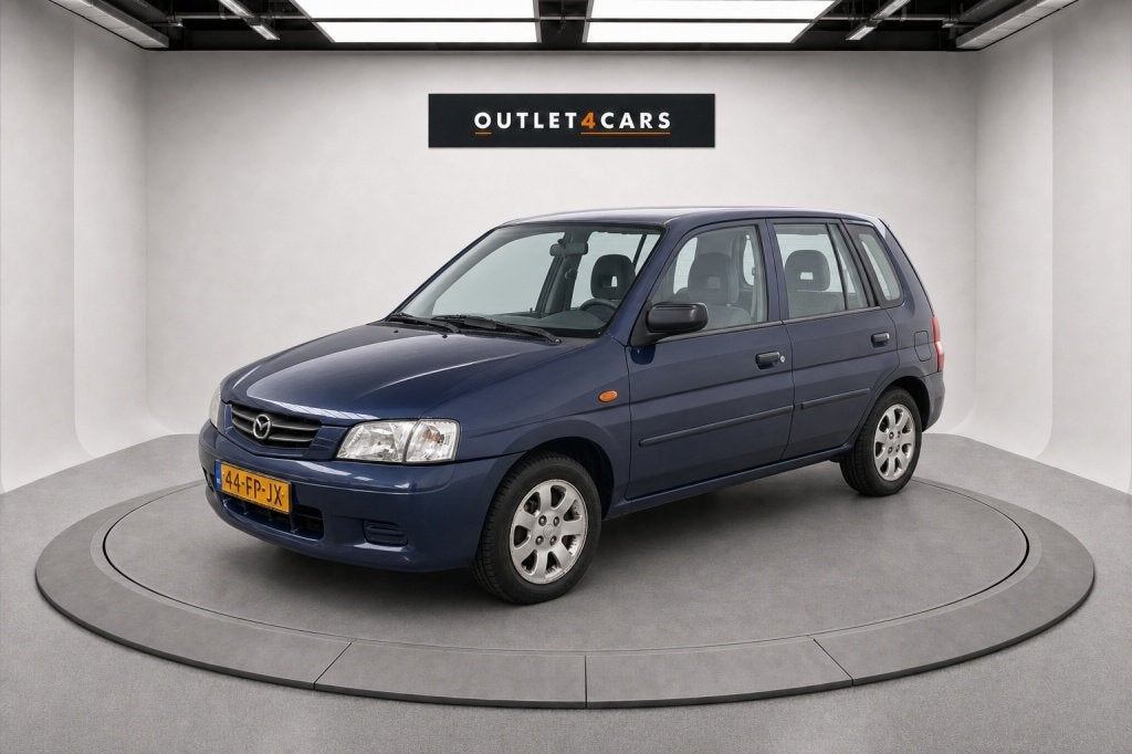 Mazda Demio 1.5 Touring (bj 2000, automaat), Auto's, Oldtimers, 1498 cc, Blauw, Origineel Nederlands, Bedrijf