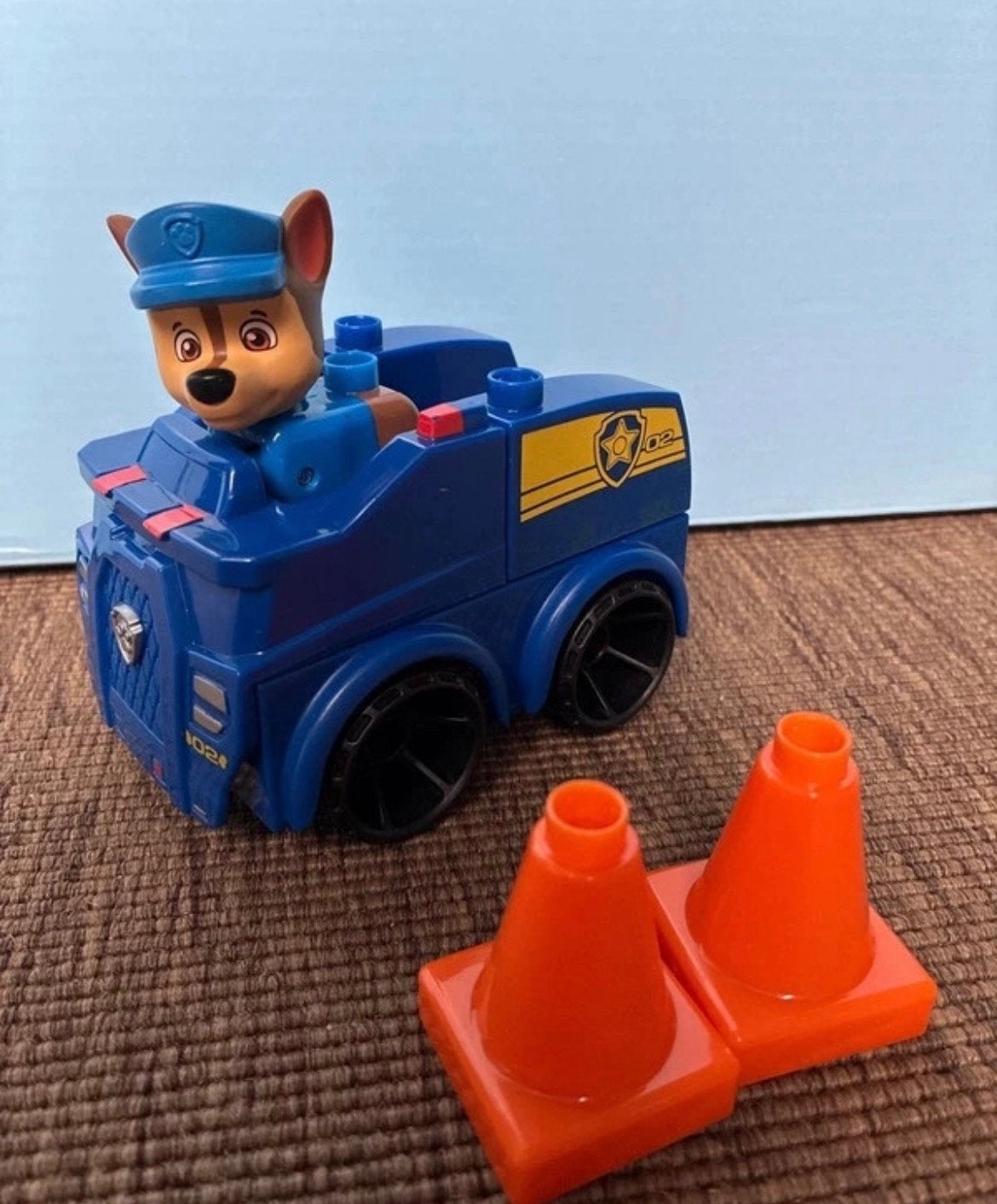 Paw Patrol Chase's Politieauto met pionnen, Ophalen of Verzenden, Zo goed als nieuw
