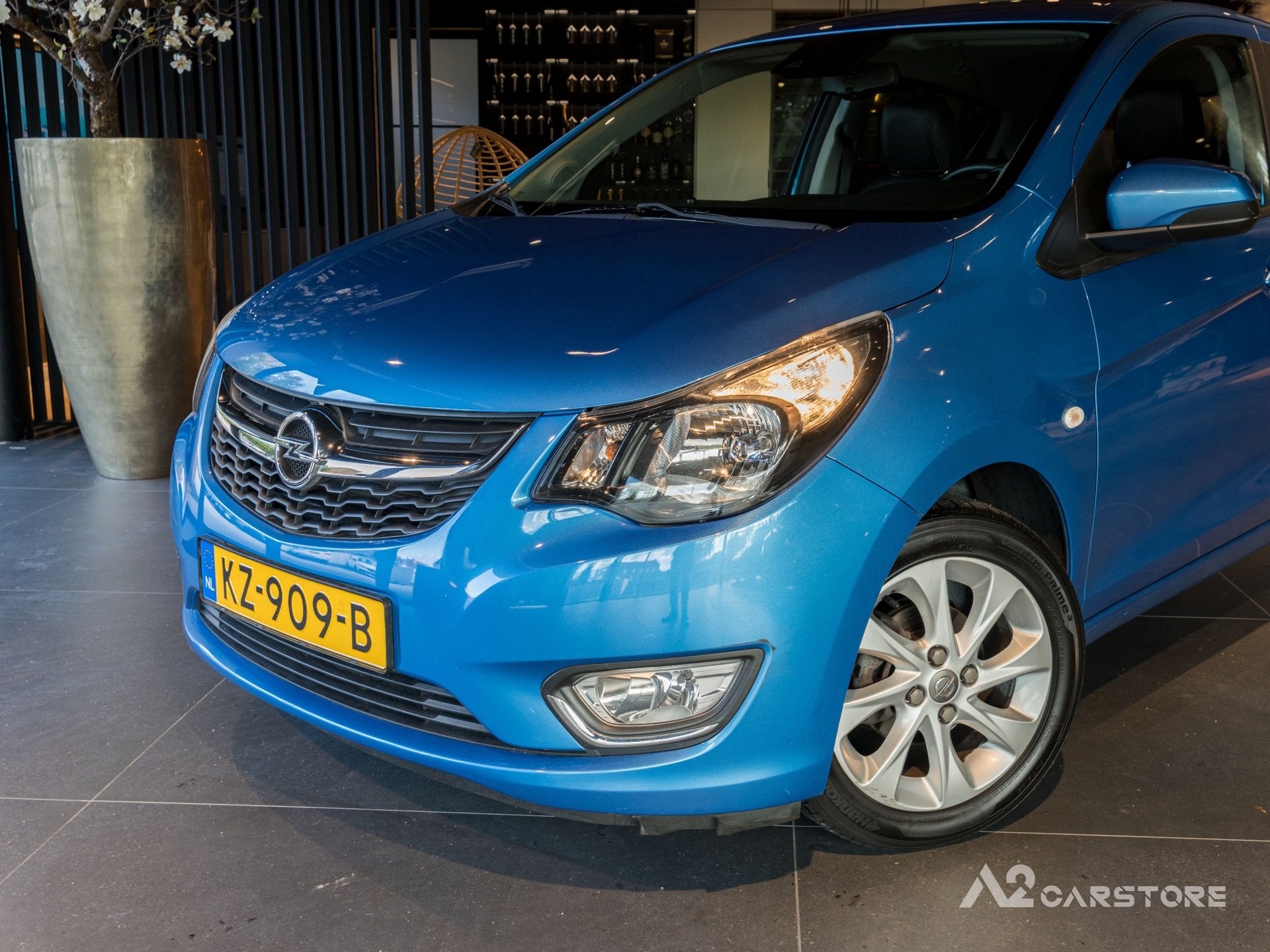 Opel KARL 1.0 ecoFLEX Innovation AUTOMAAT NAP APK AIRCO, Auto's, Gebruikt, Blauw, Verwarmde buitenspiegels, 23 km/l