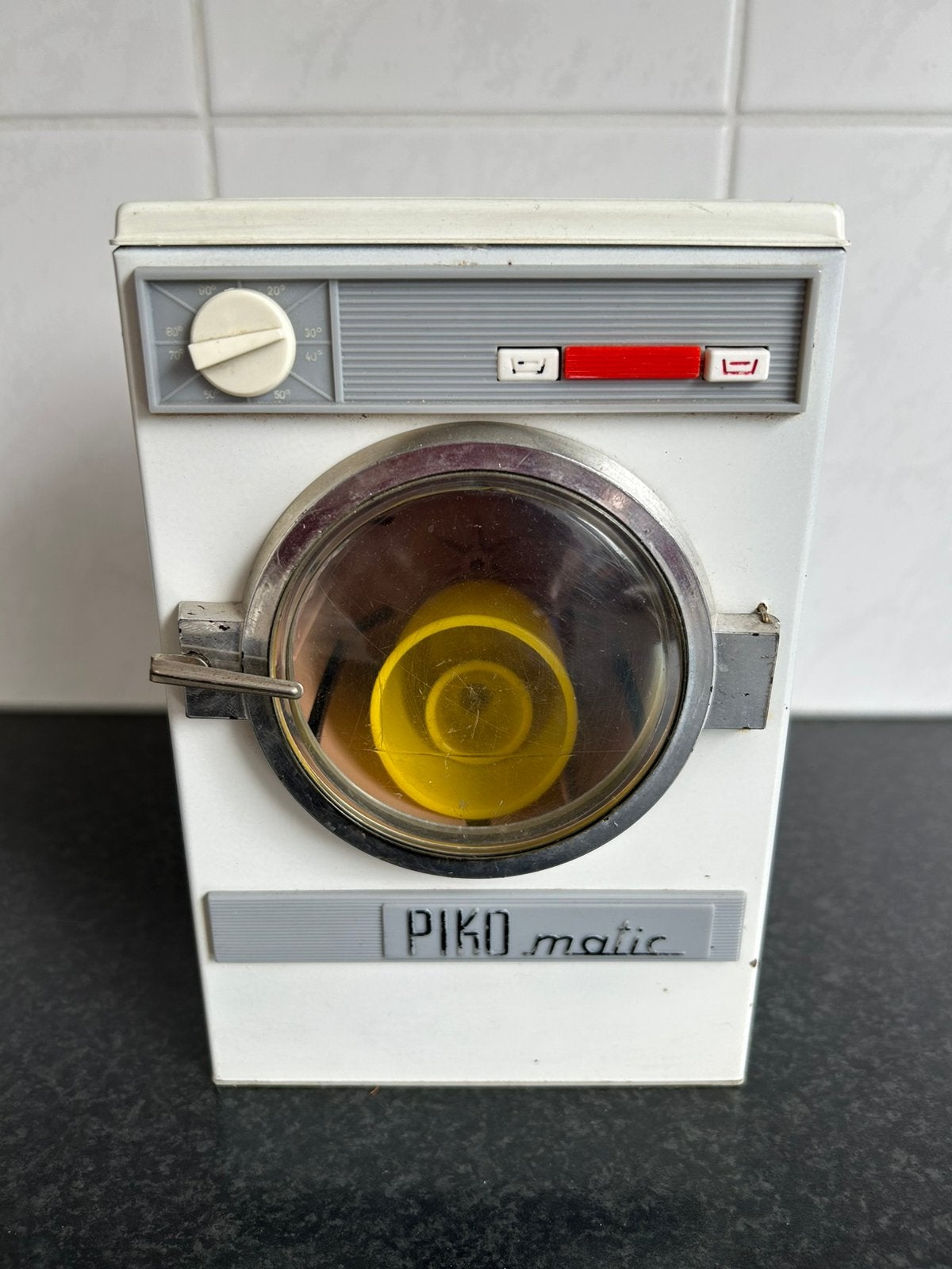 Piko-matic speelgoedwasmachine, Ophalen