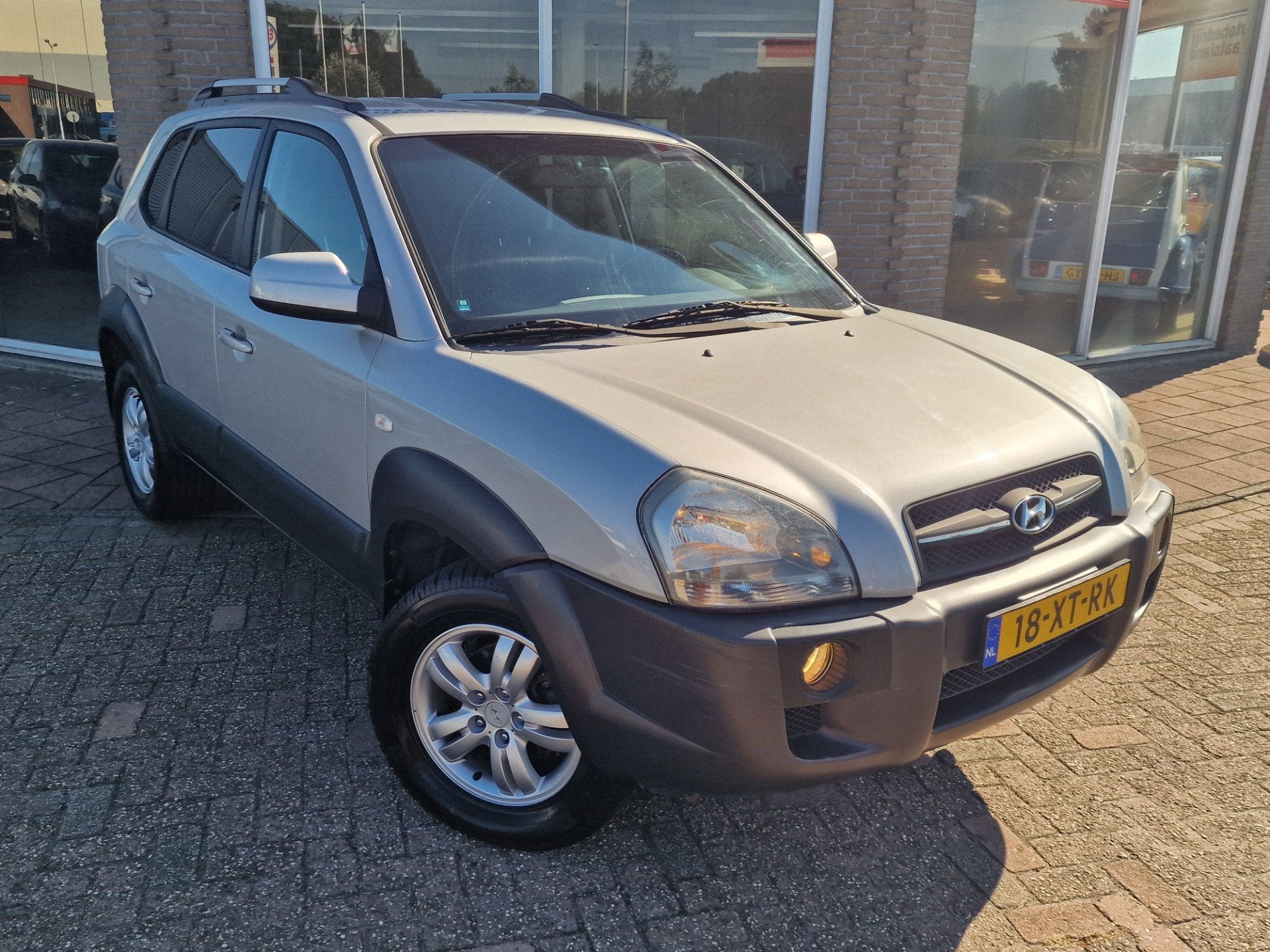 Hyundai Tucson 2.0i Dynamic Sense - Airco - Cruise -, Auto's, Stof, Gebruikt, Zwart, 4 cilinders