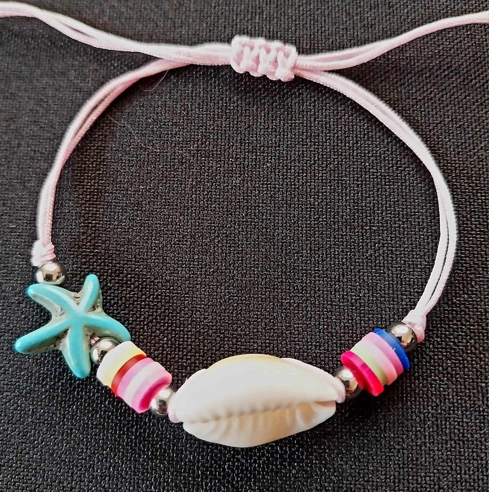 armbandje roze turquoise zeester schelp, Ophalen of Verzenden, Nieuw, Roze, Overige materialen