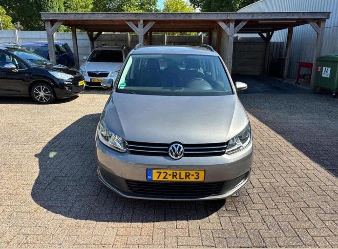 Volkswagen Touran 1.2 TSI 77KW BMT 2011 Grijs, Auto's, 4 cilinders, Origineel Nederlands, 75 €/maand, Handgeschakeld