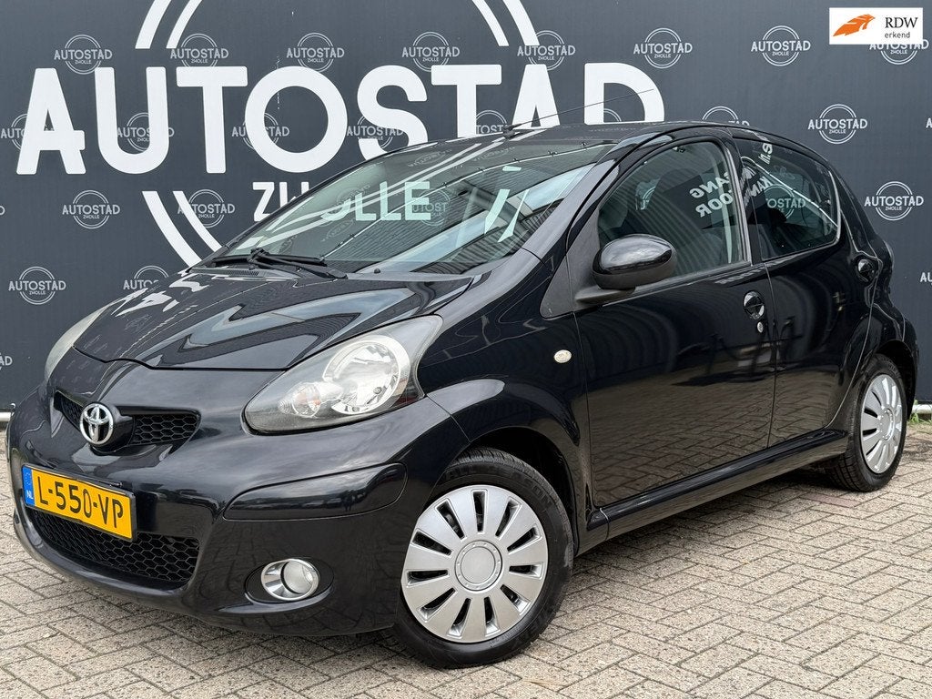 Toyota Aygo 1.0-12V Comfort Automaat / Airco / Navi / APK /, Auto's, Stof, Zwart, Bedrijf, Nieuw