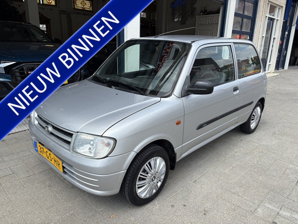 Daihatsu Cuore 1.0-12V XTi AUTOMAAT/NAP/NW APK 06-2027, Auto's, Oldtimers, 15 km/l, 4 stoelen, Origineel Nederlands, Zilver of Grijs